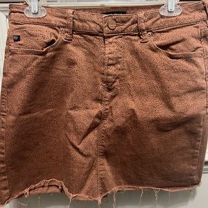 Jean skirts. Orange with black designs. From the brand Dear John.